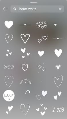 hearts and arrows are drawn in white ink on a gray background with the words heart white