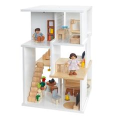 a doll house with two children playing in the room and stairs leading up to the second floor