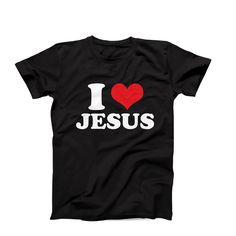 "I love Jesus T-Shirt, Christian Tee, I Heart Jesus T-Shirt, Faith-inspired Shirt, Christian Gift idea, Jesus Christ Tee, Love Jesus Tee Are you in search of a unique and personalized custom t-shirt? Well, your search ends here! We take immense pride in offering the widest range of I heart t-shirts available on the internet. But that's not all - if you don't find something that catches your eye, fret not! We would be absolutely delighted to customize a flawless I heart tee just for you. Simply c Valentine's Day Slogan Graphic T-shirt, Valentine's Day Black T-shirt With Text Print, Black Slogan T-shirt For Valentine's Day, Valentine's Day Short Sleeve Slogan T-shirt, Valentine's Day Slogan T-shirt With Short Sleeves, Valentine's Day Slogan T-shirt Short Sleeve, Valentine's Day Black Slogan T-shirt, Valentine's Day T-shirt With Slogan And Short Sleeves, Valentine's Day Black T-shirt With Slogan