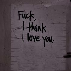 graffiti written on the side of a door that says, i think i love you