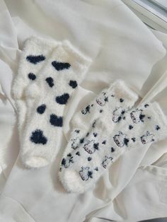 "\"Cozy Fuzzy Cow Socks, Unisex Cow Socks, Cow Print Socks, Fluffy Socks, Novelty Socks, Gift Cute Soft Socks, Fun Thickened Sleeping Socks\" Slip into a world of cozy comfort with our moo-tiful cow printed socks! Let your feet experience the fluffy goodness of walking on clouds. Whether it's for a special occasion or just a little self-indulgence, these socks are the perfect fit. Feeling festive and looking for some fuzzy fun this holiday season? We have the perfect solution! Grab both pairs at an udderly fantastic price. You can choose between our cute cow face print or our classic cow print design. Happy feet guaranteed! NOTE: Colors displayed may vary slightly depending on your screen. ~DETAILS: Measurements: One size fits all, US 5-9 Material: 100% Polyester. ~CARE INSTRUCTIONS: -When Comfortable Warm White Knee-high Socks, Cute White Winter Stockings, Cute White Stockings For Winter, Cute Socks For Stocking Stuffers, Cute Soft Socks For Stocking Stuffers, Cozy White Socks For Gifts, Cozy White Socks As Gift, Cozy White Socks As A Gift, Cute Soft White Socks