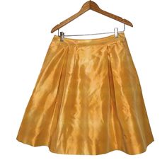 Banana Republic Yellow Gold Pleated Silk Skirt With Side Zip Closure. Size 4. Shell 100% Silk. Lining 100% Acetate. Dry Clean. Measures Approximately 14 1/2” Waist Measured Flat Across, 23” Length. Msrp $88. Nwt Fitted Gold Skirt For Spring, Elegant Yellow Flowy Skirt, Elegant Flowy Yellow Skirt, Yellow Flared Party Skirt, Elegant Yellow Pleated Skirt, Yellow Midi Skirt For Party, Yellow A-line Pleated Skirt, Yellow Pleated Skirt For Party, Yellow Flowy Skirt For Party