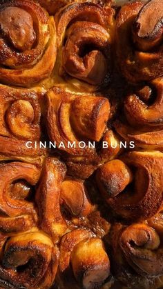 cinnamon buns in a pan with the words cinnamon buns