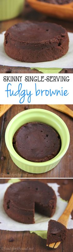 a chocolate cake sitting on top of a wooden table next to a green bowl and spoon