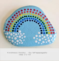 a painted rock with dots on it and the words kindness rocks by mrappagallo