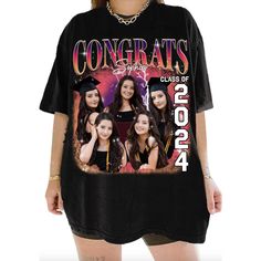 a woman wearing a black shirt with the words congrats on it