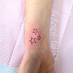 Pink Outlined Star Tattoo Pink Star Tattoo, Tattoos For Wrist, Pink Tattoo Ink, Best Star Tattoos, Star Tattoo On Wrist, Brown Tattoo Ink, Floral Back Tattoos, Small Star Tattoos, Inner Forearm Tattoo