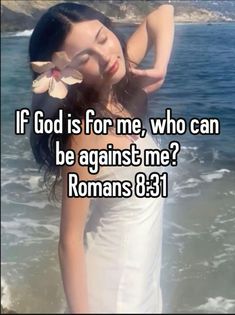 a woman standing on the beach with her arms behind her head and text that reads if god is for me, who can be against me?