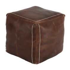 a square brown leather ottoman with white stitching