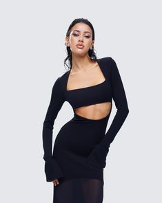 Draped in midnight magic, this black maxi dress is the perfect blend of sultry and mysterious 🖤 Made from a blend of stretch double knit and mesh fabric, and complete with a cutout bodice, this fit and flare style will have you channeling your inner seductress 😏 Bandeau Maxi Dress, Black Bandeau, White Jersey, Ruffle Shorts, Double Knit, Black Maxi, Mini Wrap Dress, Black Ruffle, Double Knitting