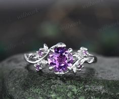 This ring is handmade by myself. The main stone is a 6.5mm round cut purple amethyst,about 1ct. The side stones are 1.5mm amethyst. The band width is about 1.4mm. The material is solid 14k gold(white,yellow,rose gold is also available) Ring size can be choose from the selection box. Matching band available: https://www.etsy.com/shop/willwork?section_id=20674906 This jewelry can also be made in solid 10k,14k,18k gold,with real diamonds.Contact me! Need rush order? contact me! Need custom making order? Contact me! I have confidence on my jewelry.30 days money back guarantee!(For returned item,as this is handmade jewelry.Handcrafted fee and shipping fee will be deducted,others will be refunded soon) Thanks for your visiting! Amethyst Engagement Ring White Gold, Wedding Ring Purple Stone, Elegant Purple Wedding Ring, Adjustable Purple Amethyst Wedding Ring, Intricate Amethyst Ring For Wedding, Fairy Engagement Ring Amethyst, Purple Engagement Rings, Engagement Ring Leaf, Amethyst Wedding Rings