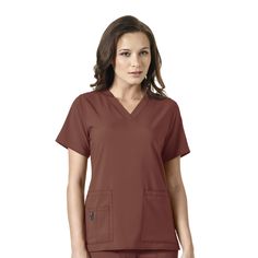 PRICES MAY VARY. Excel at Work: Available in many different colors, our embroidery-friendly Carhartt Force Cross-Flex scrubs wick sweat, dry fast, and resist odors and stains, making them perfect for any shift Stretchy, Durable, Comfortable: This lightweight medical top features stretchy polyester-spandex fabric, triple-stitched shoulder seams, and a buttonhole for your badge clip, headphones and more Intelligent 7-Pocket Design: Four front lower pockets, a double pocket at the sleeve, an inner Carhartt Scrubs Woman Black, Carhartt Scrubs, Cotton Relaxed Fit T-shirt For Nursing, Crew Neck Cotton T-shirt For Nursing, Carhartt Womens, Safety Clothing, Polyester Spandex Fabric, Working People, Work Safety