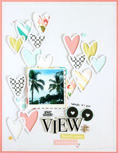 a scrapbook page with hearts and palm trees in the background, including a photo