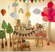 a birthday party with balloons and decorations