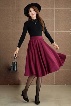 Discover elegance in our wine-red wool pleated midi skirt, a timeless addition to your winter wardrobe. The rich wine-red hue exudes sophistication, while the premium wool fabric ensures warmth and comfort.  DETAILS: * 30% wool, 30% fiber, 40% polyester * Fully satiny liner * Two side pockets * Left zipper closure * Left buttons decoration * Pleated skirt, circle skirt * Back elastic waist * High waist skirt * Below the knee skirt * Perfect for Winter, autumn * Dry clean * Lean More about the it Burgundy Skirt Outfit, Custom Skirt, Skirt Circle, Wool Midi Skirt, Below The Knee Skirt, Skirt Wool, Burgundy Skirt, Knee Skirt, Knee Skirts