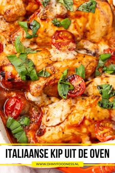 a casserole dish with chicken, tomatoes and basil