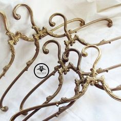 an ornate metal rack on a white sheet