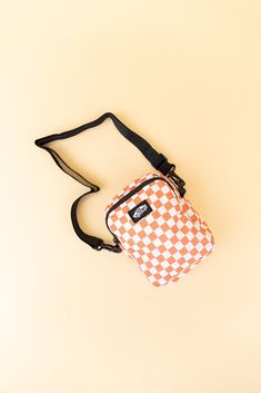 Small but mighty, the Go Getter Shoulder Bag is made for days when you can't slow down. Along with an adjustable strap, this stylish bag features an exterior zip pocket for secure but quick access, a back slip pocket, our iconic skateboard logo patch, and an allover checkerboard pattern. 6.75”H x 5”W x 3”D Skateboard Logo, Go Getter, Checkerboard Pattern, Stylish Bag, Patch Logo, Adjustable Straps, Zip Pockets, Skateboard, 3 D