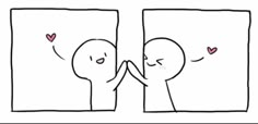 two people are touching each other's hands in front of a mirror with hearts on it