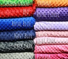 several colors of towels stacked on top of each other with the words, royal blue, navy blue, pink, light pink, and green