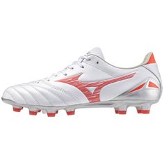 a white soccer shoe with red accents