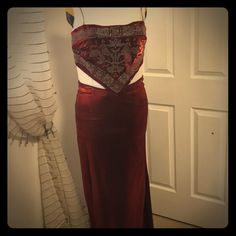 This Set Has A Nice Long Skirt In A Beautiful Deep Red Color With A Touch Of Shimmer To It. Slight V In The Waist, At The Center Of The Front And Back. Back Zipper For Easy On/Off. Top Is A Handkerchief Design Made From The Same Beautiful Deep Red Fabric As The Skirt. It Has Skinny Straps And Ties At The Back For Custom Fit. Skirt And Top Are Fully Line In A Black Fabric. The Top Is Embellished With Lots Of Iridescent Glass Bead Work. Say It Is Xl Size, But The Bottom Fits More Like A Large. Elegant Red Skirt For Night Out, Red Satin Party Skirt, Elegant Red Holiday Skirt, Red Long Skirt For Night Out, Red Satin Skirt For Formal Occasions, Red Satin Formal Skirt, Red Fitted Skirt For Evening, Elegant Red Evening Skirt, Elegant Red Skirt For Date Night