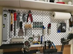 there are many tools on the pegboard in this workbench, and it's easy to use