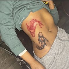 a woman with a dragon tattoo on her stomach