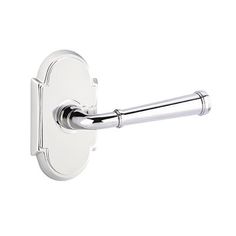 a chrome toilet roll holder with the handle on an isolated white wall mounted toilet paper dispenser