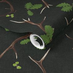 a purple fabric with green leaves on it