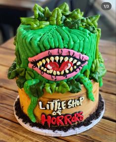 a cake decorated to look like a monster's head