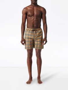 Indulge in the epitome of luxury with these iconic Burberry Vintage Checked Swim Shorts. Crafted with exquisite attention to detail, these shorts feature a timeless brown check pattern set against beautiful blue hues, creating a classic and sophisticated look that exudes elegance and style. Made with high-quality raffia, they offer a lightweight and comfortable feel, perfect for all your beach and poolside adventures this season. Timeless brown check pattern High-quality raffia material Back poc Vintage Swim, Burberry Vintage, Brand Book, Printed Swim, Swimwear Sale, Check Pattern, Blue Hues, Burberry Bag, Swim Shorts