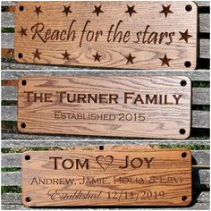 three wooden signs that say reach for the stars and the name of each family on them