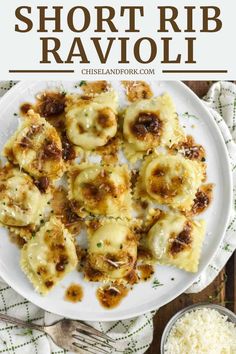 short rib ravioli on a white plate with parmesan cheese