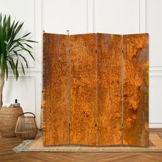 a room divider made out of rusty metal