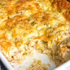 a casserole dish with chicken and vegetables in it, ready to be eaten