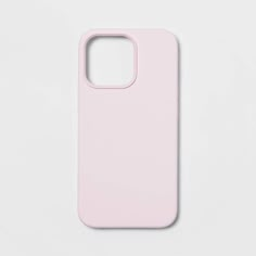 a pink phone case sitting on top of a white surface