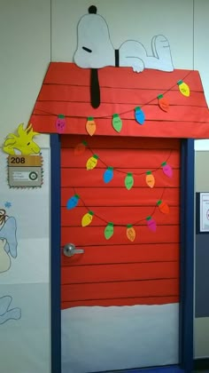 a door decorated to look like a dog house