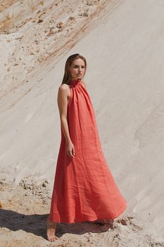 "Introducing our coral linen halter dress, a perfect blend of style and sustainability. Crafted from organic linen, this dress not only looks beautiful but also aligns with your eco-conscious values. Its smock silhouette creates a relaxed and comfortable fit, while the A-line design adds a touch of elegance. For a versatile and chic option, consider our linen shift dress, perfect for both work and play. If you prefer a loose and airy feel, our loose linen dress is the ideal choice. Embrace the b Flowy Linen Sundress, Flowy Linen Beach Dress For Spring, Linen Sundress Midi Dress For Vacation, Chic Linen Maxi Sundress, Maxi Length Linen Beach Dress For Vacation, Linen Sundress In Maxi Length, Linen Maxi Beach Dress For Vacation, Linen Beach Dress For Vacation In Maxi Length, Chic Linen Halter Neck Dress