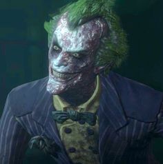 the joker from batman ark is dressed up in a suit and tie with green hair