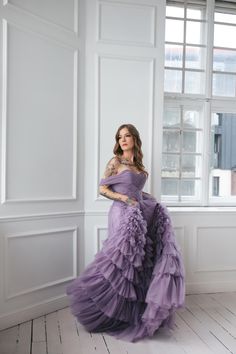 Transform into a majestic fairy tale princess  with our magical floor-length purple dress.  Perfect for weddings, proms, and photo sessions,  it features a voluminous skirt and satin lace on the back  for an extra touch of enchantment.  Be the belle of the ball and make your special occasion truly unforgettable! Message me for custom details. Gown With Ruffles, Fairy Tale Princess, Voluminous Skirt, Tulle Gown, Purple Dress, Dress Clothes For Women, Fairy Tale, Photo Sessions, Gowns Dresses