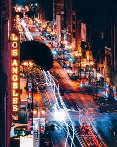 an aerial view of a city street at night