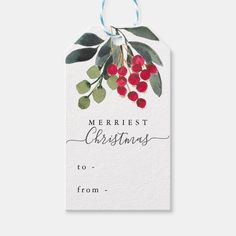 a christmas gift tag with berries on it