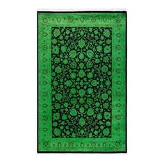 a green and black rug with an intricate design on the center, in front of a white background