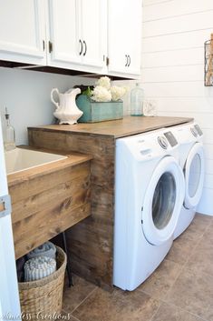 a washer and dryer in a small room