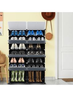 the shoe rack is holding several pairs of shoes