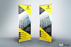 two yellow roll up banners with the words security on them