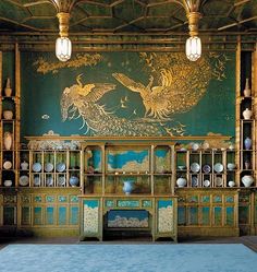 an ornately decorated room with blue and gold walls