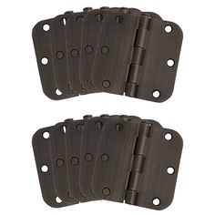 set of four dark brown metal door hinges with holes on each one side