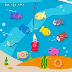 an image of a fish game on the beach with different colored fishes and corals